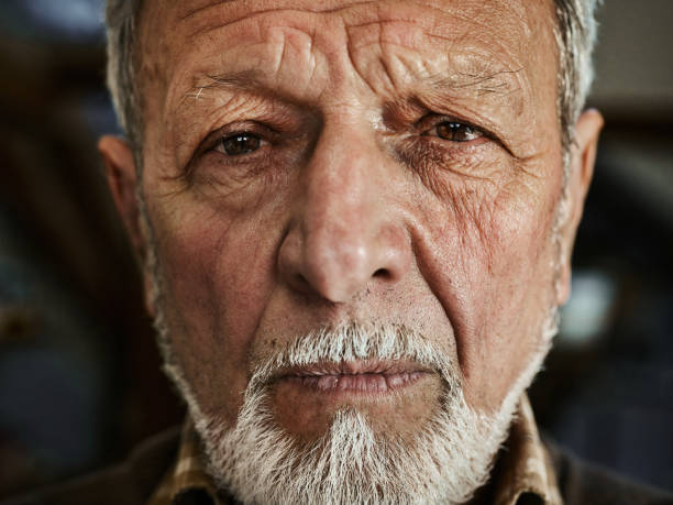 istock Senior man with beard at home. 2188156483
