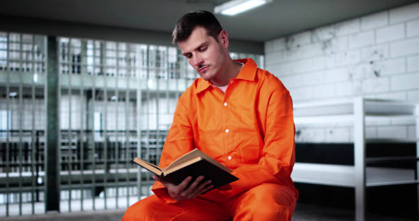 Prayer Man Reading Bible Book In Prison