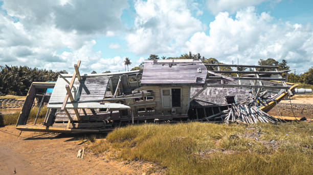 istock A wooden boat that has been destroyed and abandoned. 2188160319