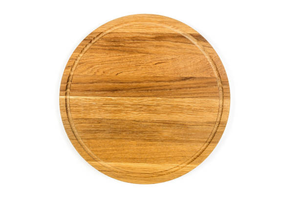 istock Empty round wooden plate isolated on white background 2188160665