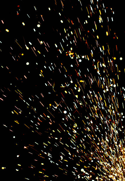 istock A black background with a lot of sparks and fire 2188162703