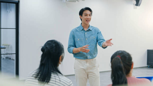 istock Professional Discussion with a Young Team Leader Motivating Colleagues in a Casual Workspace 2188163095