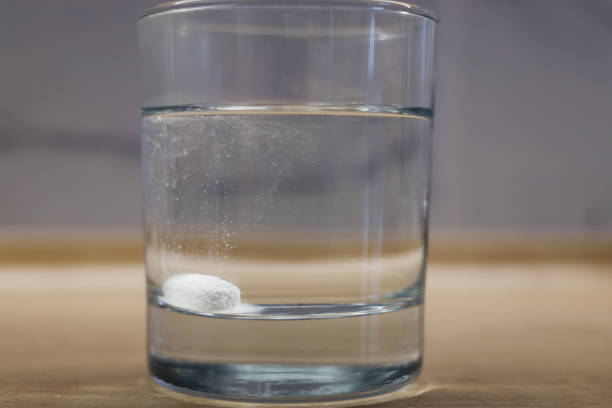 istock glass with medical pill 2188163769