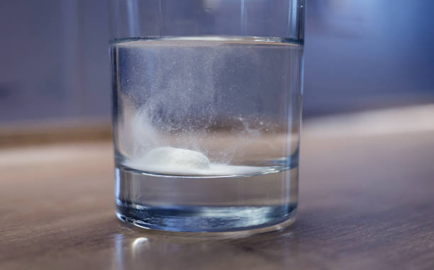 istock Fizzy tablet in glass of water 2188163776