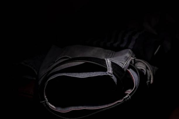 istock low key close-up of pants in the dark 2188164986
