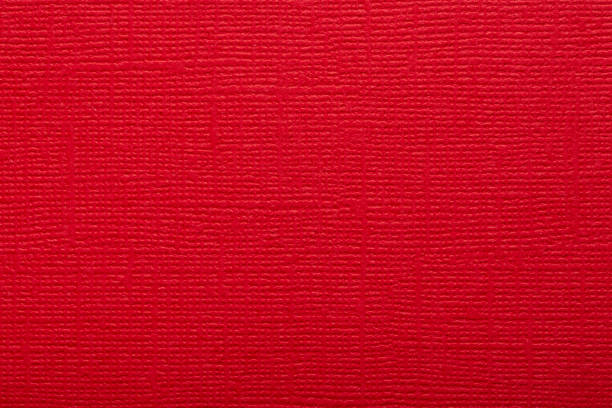 istock Red paper fabric texture. Red canvas embossed cardboard texture as a background 2188166267
