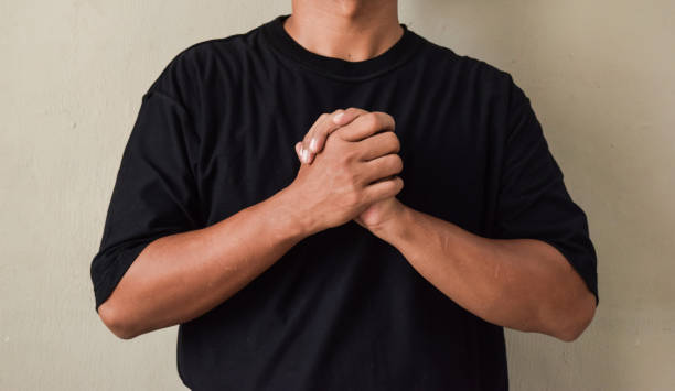 istock Young man saying believe in sign language, showing asl lesson, communication 2188168436