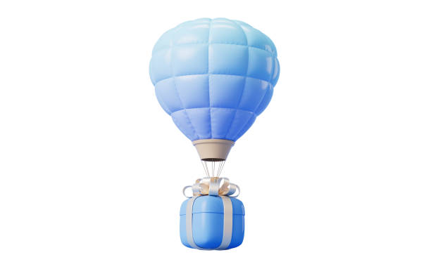 Hot air balloon is inflating before liftoff at sunrise