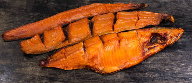 istock Cold smoked half and backs of different freshwater fishes 2188170805