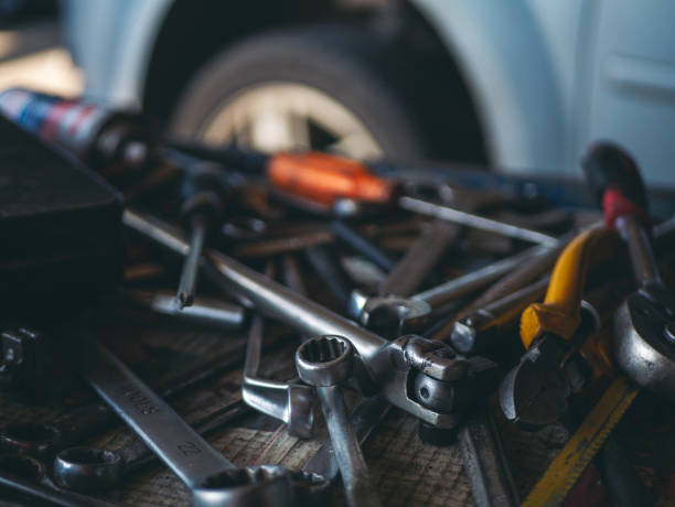 istock Mechanic tools engineering equipment car auto repair shop with copy space. Blurred background mechanical service. Heavy screw grungy rusted wrenches dirty screwdriver object. Industrial hardware set 2188173393