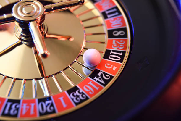 istock Ball fixed on the red five of a casino roulette 2188175892