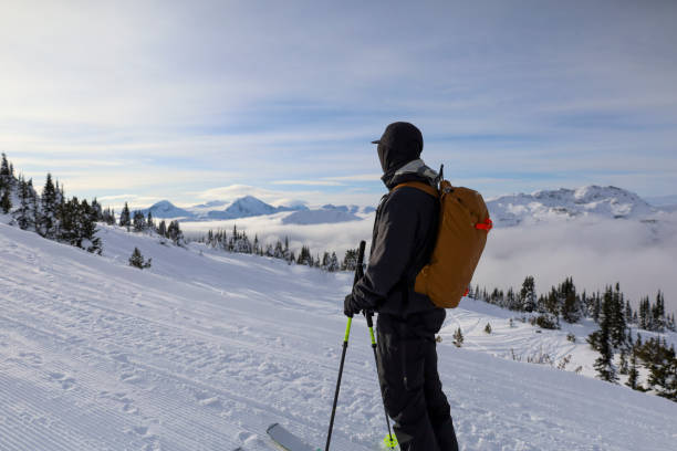 istock Ski mountaineer ascends ski track at resort 2188176611