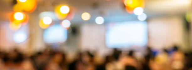 istock Banner Blurred background people join seminar business event auditorium hall convention. Banner Presentation meeting conference room present screen business. Blurred background with copy space 2188177232