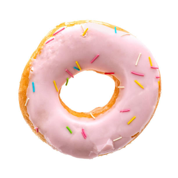 istock Tasty pink donut with sprinkles isolated on white background. Top view 2188177822
