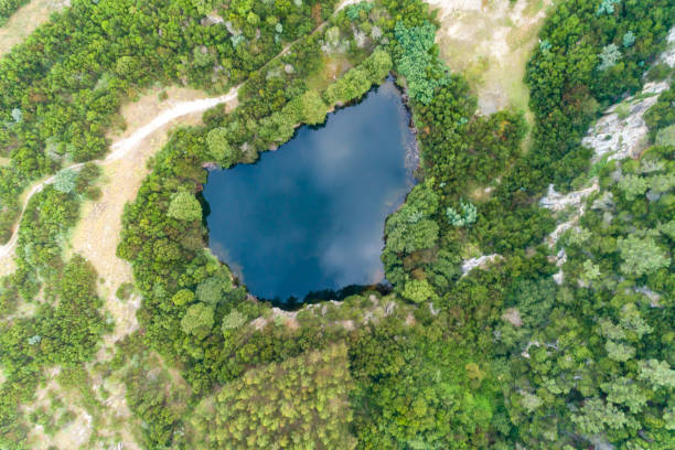 istock lagoon formed in an abandoned old quarry, top view from a drone 2188178995