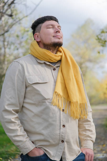 istock young man enjoying autumn days breathing fresh air 2188180104