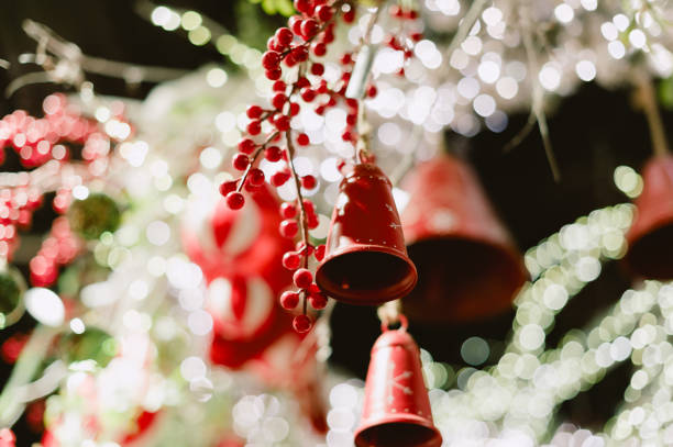 istock A bunch of red bells hanging from a tree. Christmas 2188180465