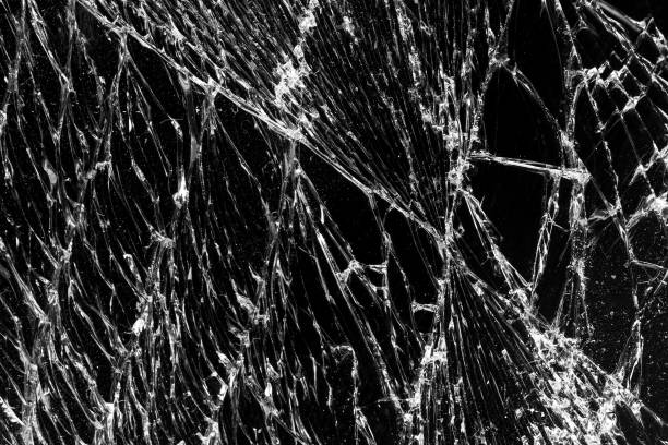 istock Broken black glass abstract background. Black cracked Touch Screen Phone display background. Texture for your project. 2188180598