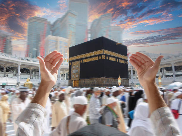 istock People praying at the holy kaaba, Mecca 2188182470