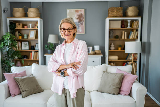 istock Smiling mature woman at home 2188182776