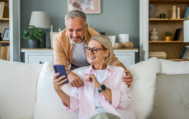 istock Happy mature couple using a smartphone 2188182783