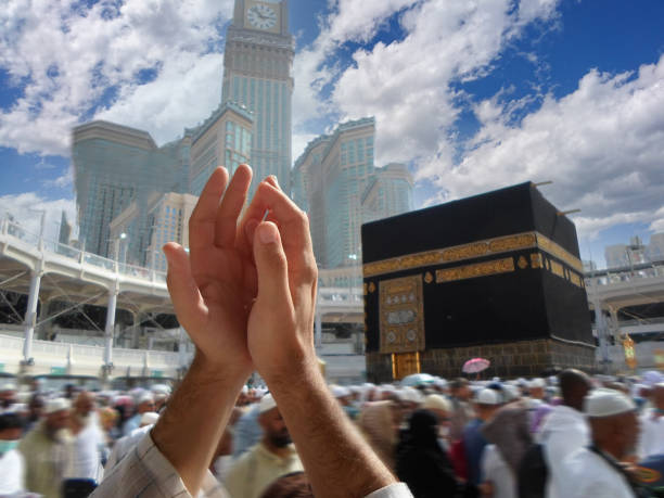 istock People praying at the holy kaaba, Mecca 2188182839