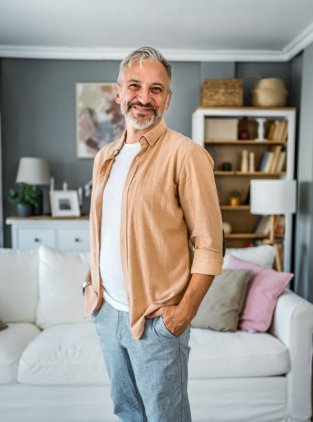 istock Smiling mature man at home 2188182877
