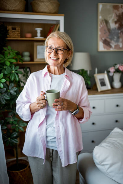 istock Woman with coffee at home 2188183010