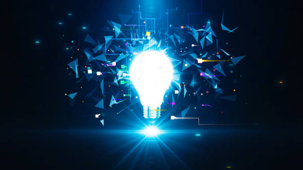 istock A glowing light bulb radiates energy, surrounded by vibrant digital geometric shapes and dynamic particles on a dark blue background, symbolizing creativity and technology. 2188183143