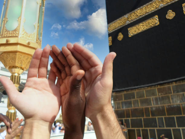 istock People praying at the holy kaaba, Mecca 2188183526