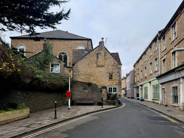 istock Shops and house on a street 2188184483