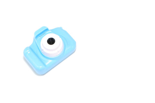 A toy camera isolated on white background closeup view with copy space