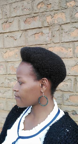 istock Natural hair style with cornrow on one side 2188188353