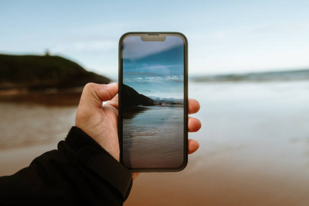 istock Taking a photo of a beach 2188192078
