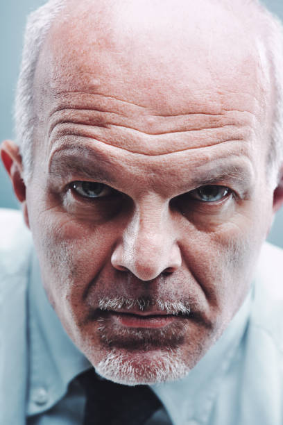 istock Serious mature businessman staring intensely at the camera 2188192209