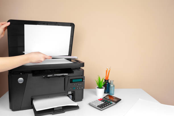istock Woman using the printer to scanning and printing document 2188192494