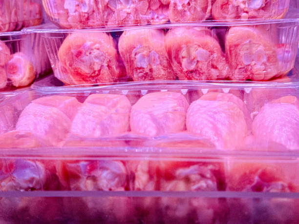 istock Packaged Raw Chicken Thighs in Plastic Trays 2188196965