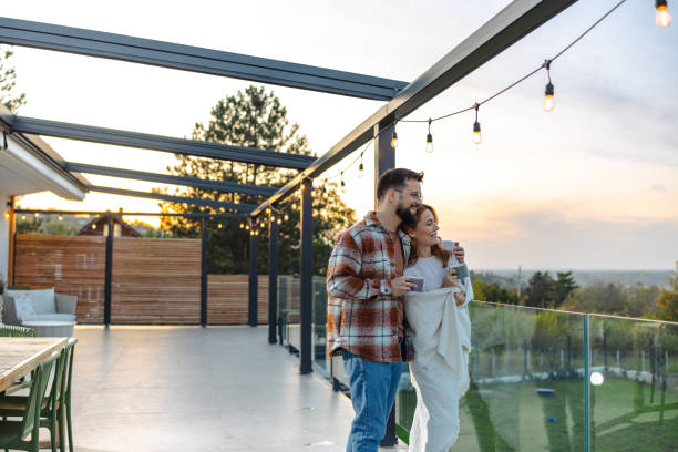 istock Couple enjoying peaceful evening on a scenic modern terrace 2188198181