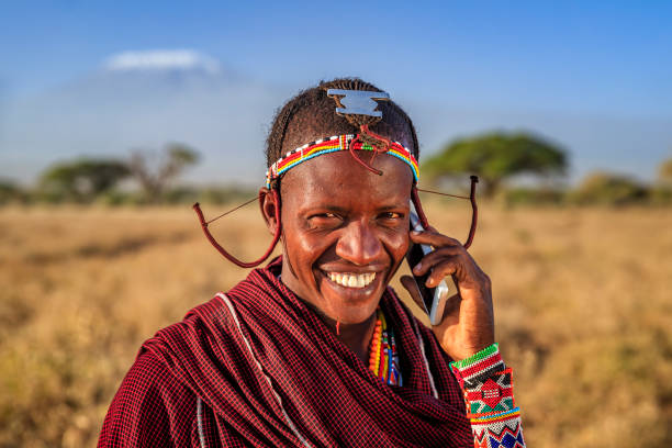 istock Warrior from Maasai tribe using mobile phone, Kenya, Africa 2188203624