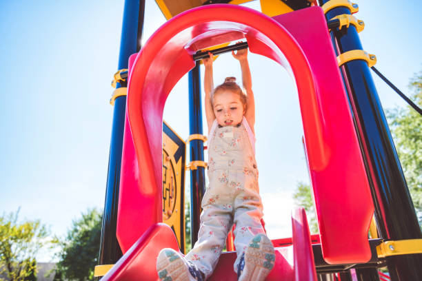 istock Happy kid slide on playground on summer season 2188204526