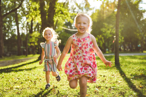 istock Happy kid having fun play together on summer season 2188205619