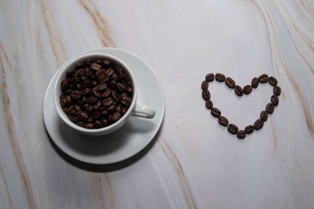 istock a cup of coffee with coffee beans 2188205804