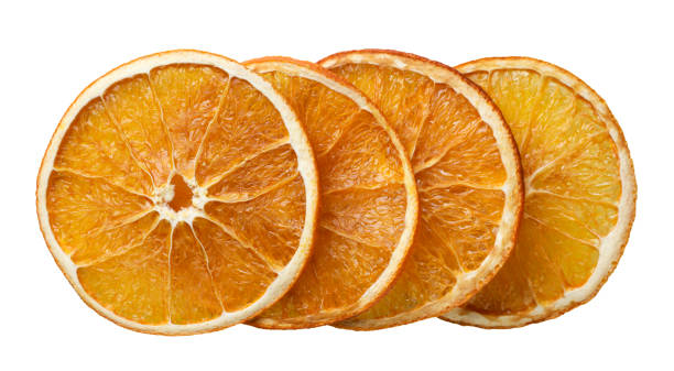 istock Dry orange fruit pieces cut out on white. Top view 2188208524
