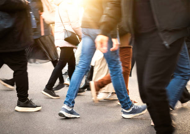 istock Pedestrians walking in abstract urban scene 2188208630