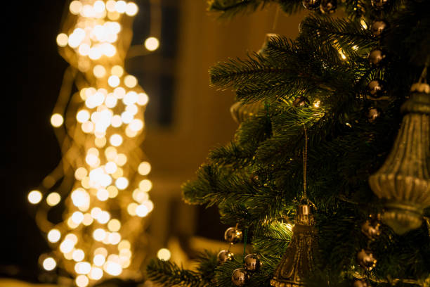 istock Cozy Christmas Tree with Warm Fairy Lights and Decorations 2188208768