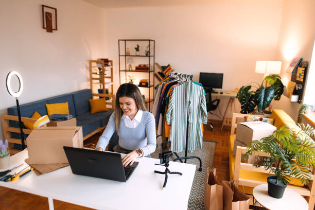 Woman works on her laptop.