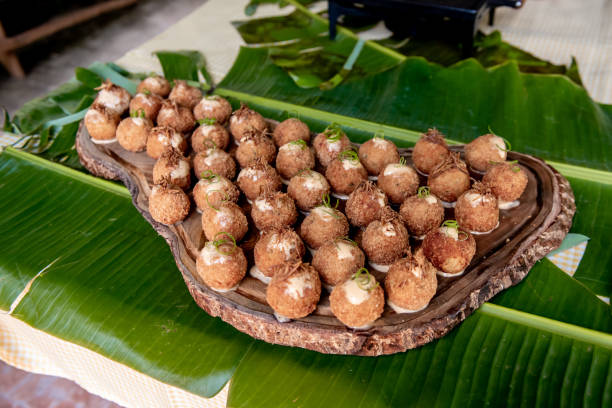 istock rustic cuisine, fish cakes on a wooden board and banana leaf 2188213201