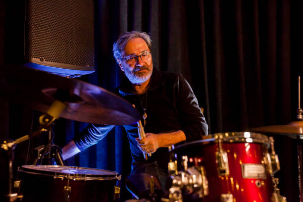 istock Front View Of A Drummer Preparing For A Live Performance During Rehearsal 2188214299
