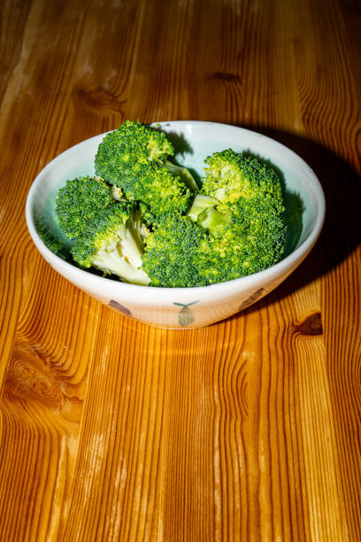 istock Plate with broccoli on a wooden table 2188214718