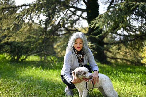 istock Senior woman with  her dog 2188218304